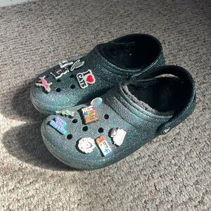 CROCS Glittery Black Clogs with Charms